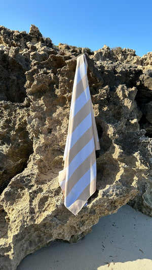 Sand-free beach towel in Sand Beige Cream colour, made from recycled materials for eco-conscious beachgoers. Our minimalist design towels are quick-dry, ultra-absorbent, lightweight and compact, and come in a convenient neoprene water resistant pouch for easy transport or storing your sunnies, keys etc. while enjoying the outdoors. Sizes available, Kids, Regular and XL Share Towel
