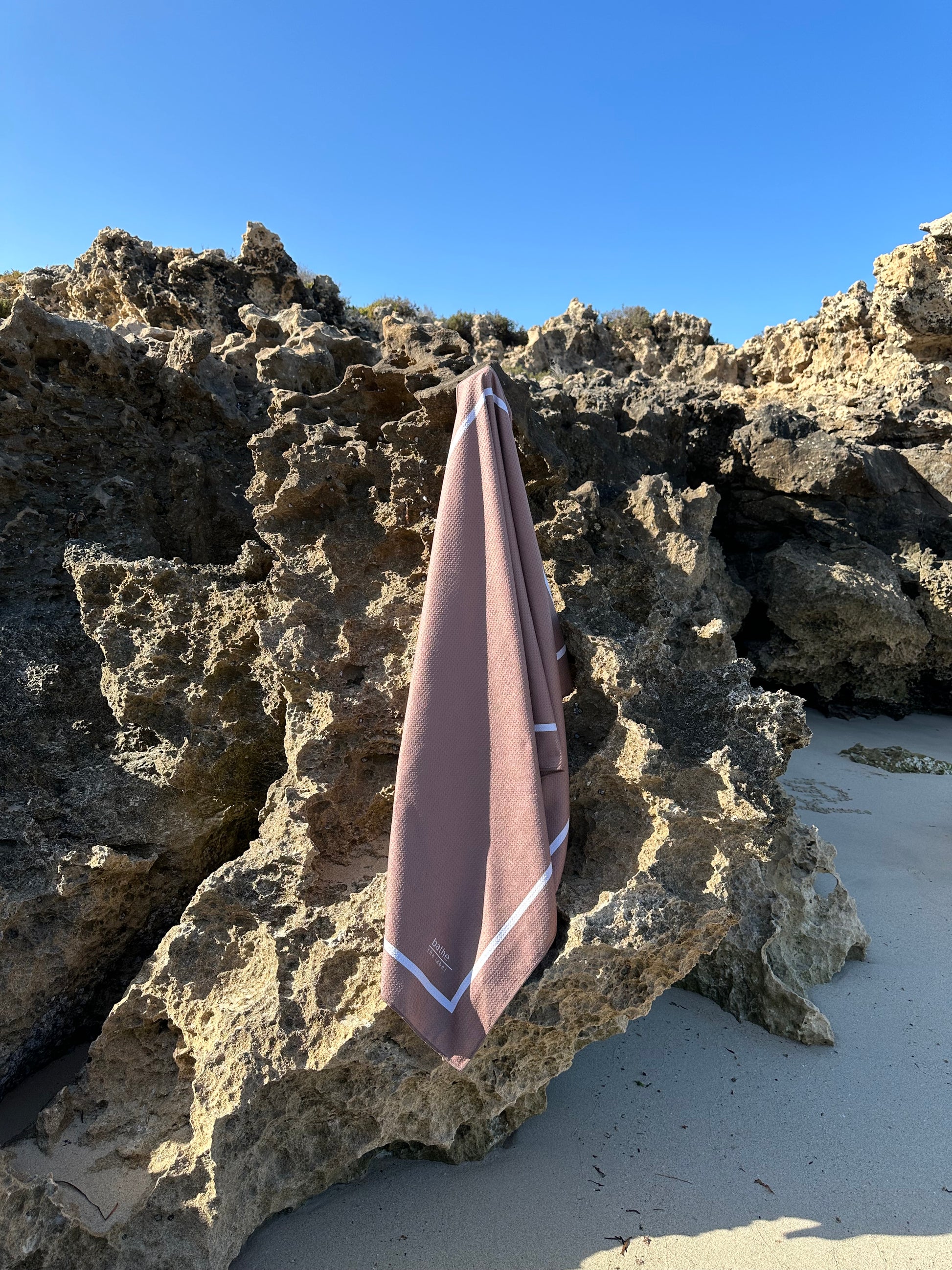 Sand-free beach towel in Coconut brown colour, made from recycled materials for eco-conscious beachgoers. Our minimalist design towels are quick-dry, ultra-absorbent, lightweight and compact, and come in a convenient neoprene water resistant pouch for easy transport or storing your sunnies, keys etc. while enjoying the outdoors. Sizes available: Kids, Regular and XL Share Towel