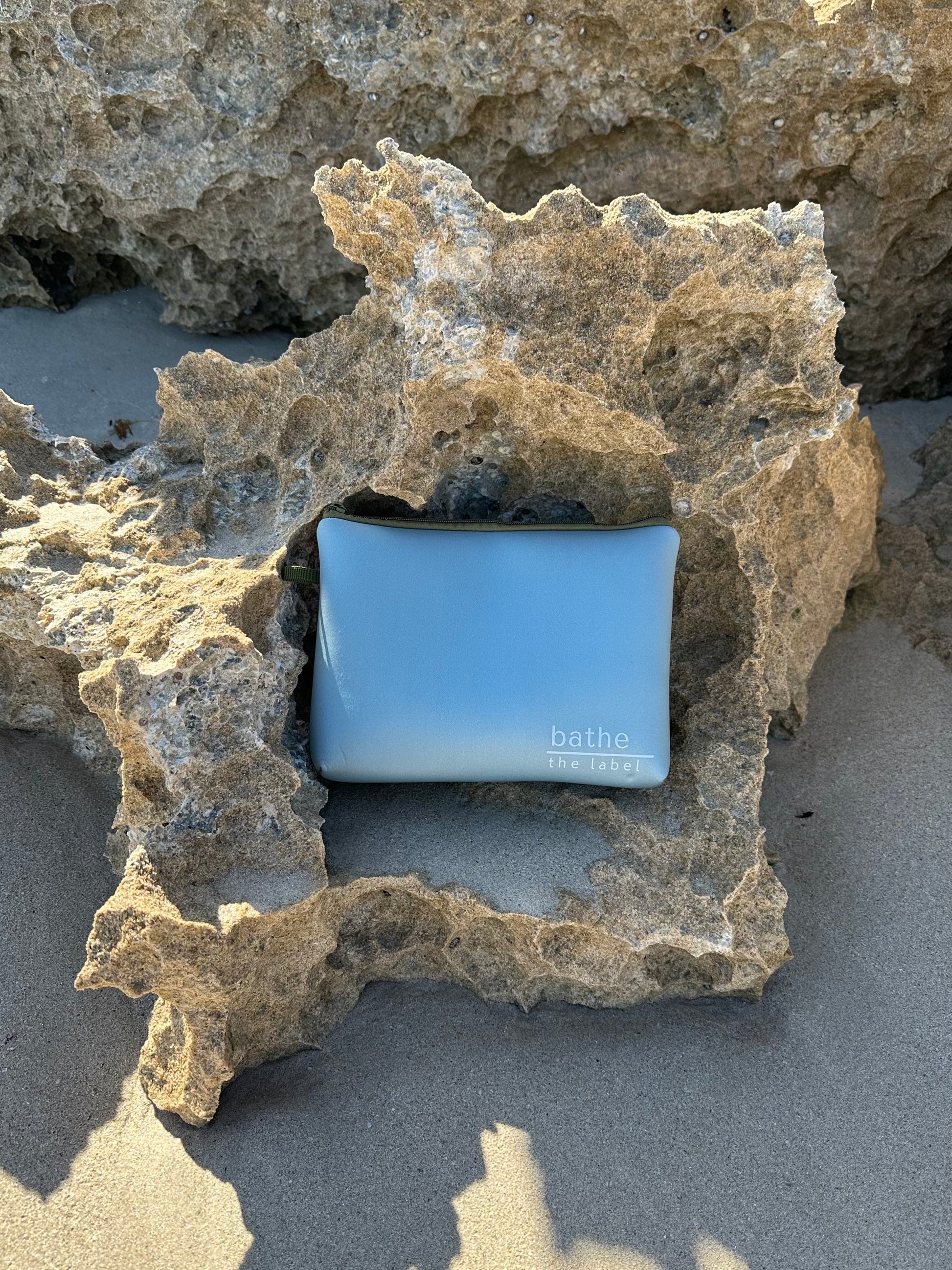 Sand-free beach towel in Sage olive green colour, made from recycled materials for eco-conscious beachgoers. Our minimalist design towels are quick-dry, ultra-absorbent, lightweight and compact, and come in a convenient neoprene water resistant pouch for easy transport or storing your sunnies, keys etc. while enjoying the outdoors. Sizes available: Kids, Regular and XL Share Towel