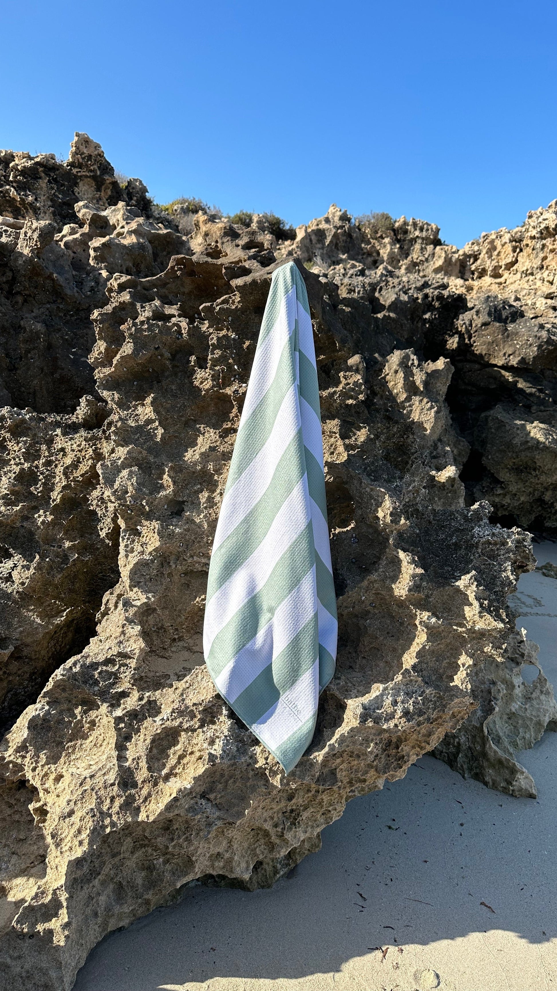Sand-free beach towel in Sage olive green colour, made from recycled materials for eco-conscious beachgoers. Our minimalist design towels are quick-dry, ultra-absorbent, lightweight and compact, and come in a convenient neoprene water resistant pouch for easy transport or storing your sunnies, keys etc. while enjoying the outdoors. Sizes available: Kids, Regular and XL Share Towel