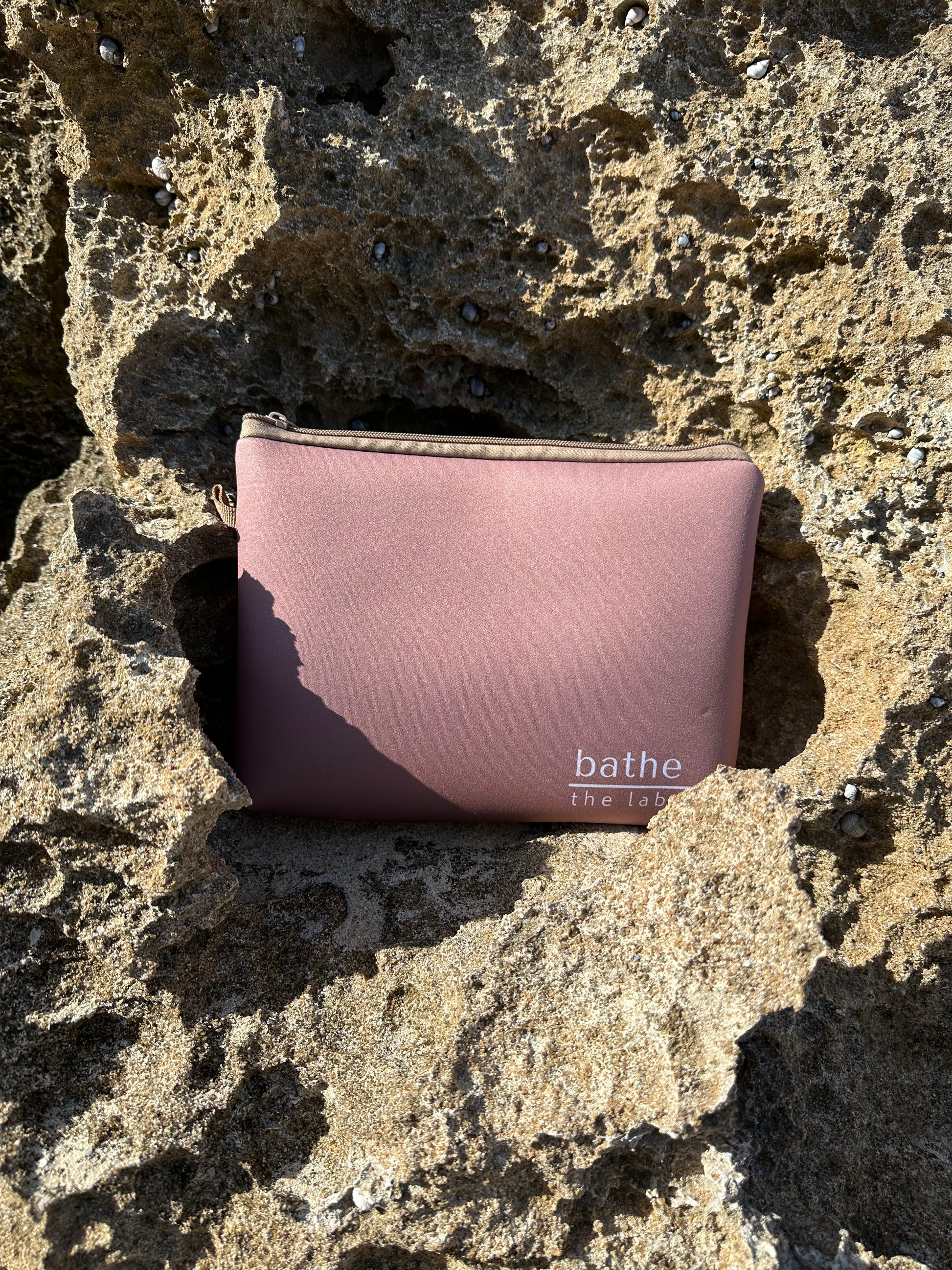 Sand-free beach towel in Coconut brown colour, made from recycled materials for eco-conscious beachgoers. Our minimalist design towels are quick-dry, ultra-absorbent, lightweight and compact, and come in a convenient neoprene water resistant pouch for easy transport or storing your sunnies, keys etc. while enjoying the outdoors. Sizes available: Kids, Regular and XL Share Towel