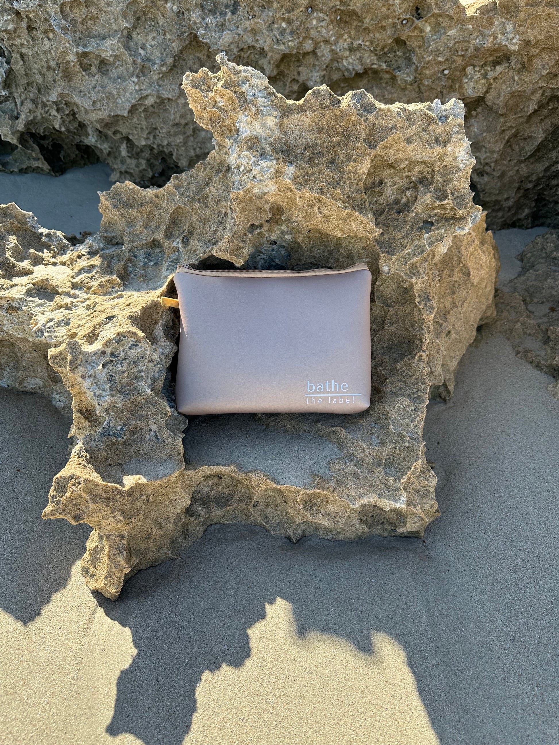 Sand-free beach towel in Sand Beige Cream colour, made from recycled materials for eco-conscious beachgoers. Our minimalist design towels are quick-dry, ultra-absorbent, lightweight and compact, and come in a convenient neoprene water resistant pouch for easy transport or storing your sunnies, keys etc. while enjoying the outdoors. Sizes available, Kids, Regular and XL Share Towel