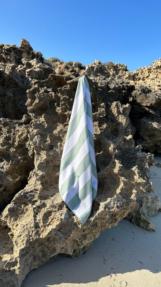 Sand-free beach towel in Sage olive green colour, made from recycled materials for eco-conscious beachgoers. Our minimalist design towels are quick-dry, ultra-absorbent, lightweight and compact, and come in a convenient neoprene water resistant pouch for easy transport or storing your sunnies, keys etc. while enjoying the outdoors. Sizes available: Kids, Regular and XL Share Towel