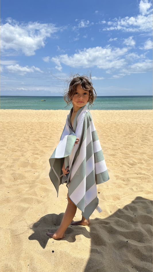 Kids Sand-free beach towel in Sage olive green colour, made from recycled materials for eco-conscious beachgoers. Our minimalist design towels are quick-dry, ultra-absorbent, lightweight and compact, and come in a convenient neoprene water resistant pouch for easy transport or storing your sunnies, keys etc. while enjoying the outdoors. Sizes available: Kids, Regular and XL Share Towel